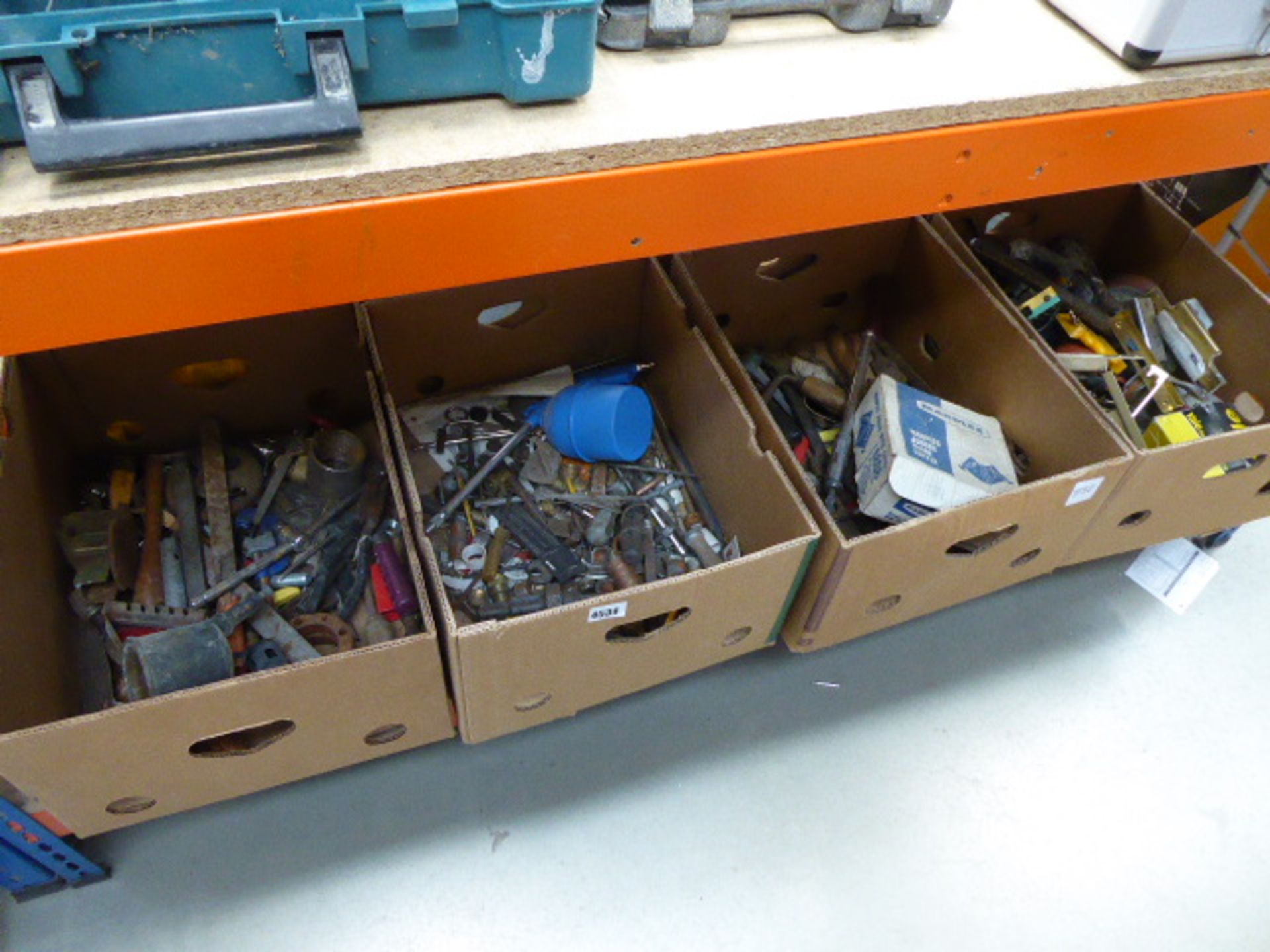 Half an underbay of assorted tools and fixings, latches, locks, etc