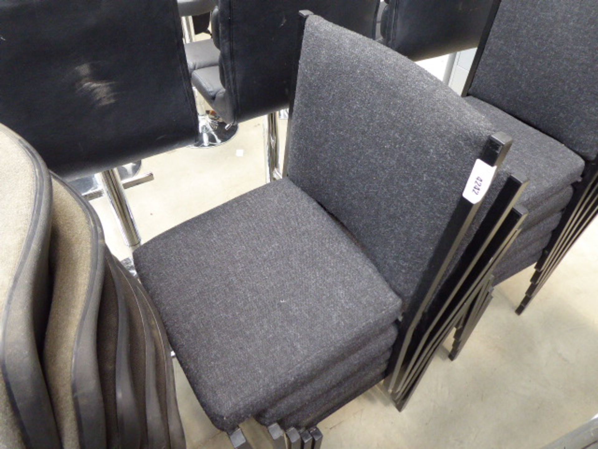 10 grey cloth stacking chairs