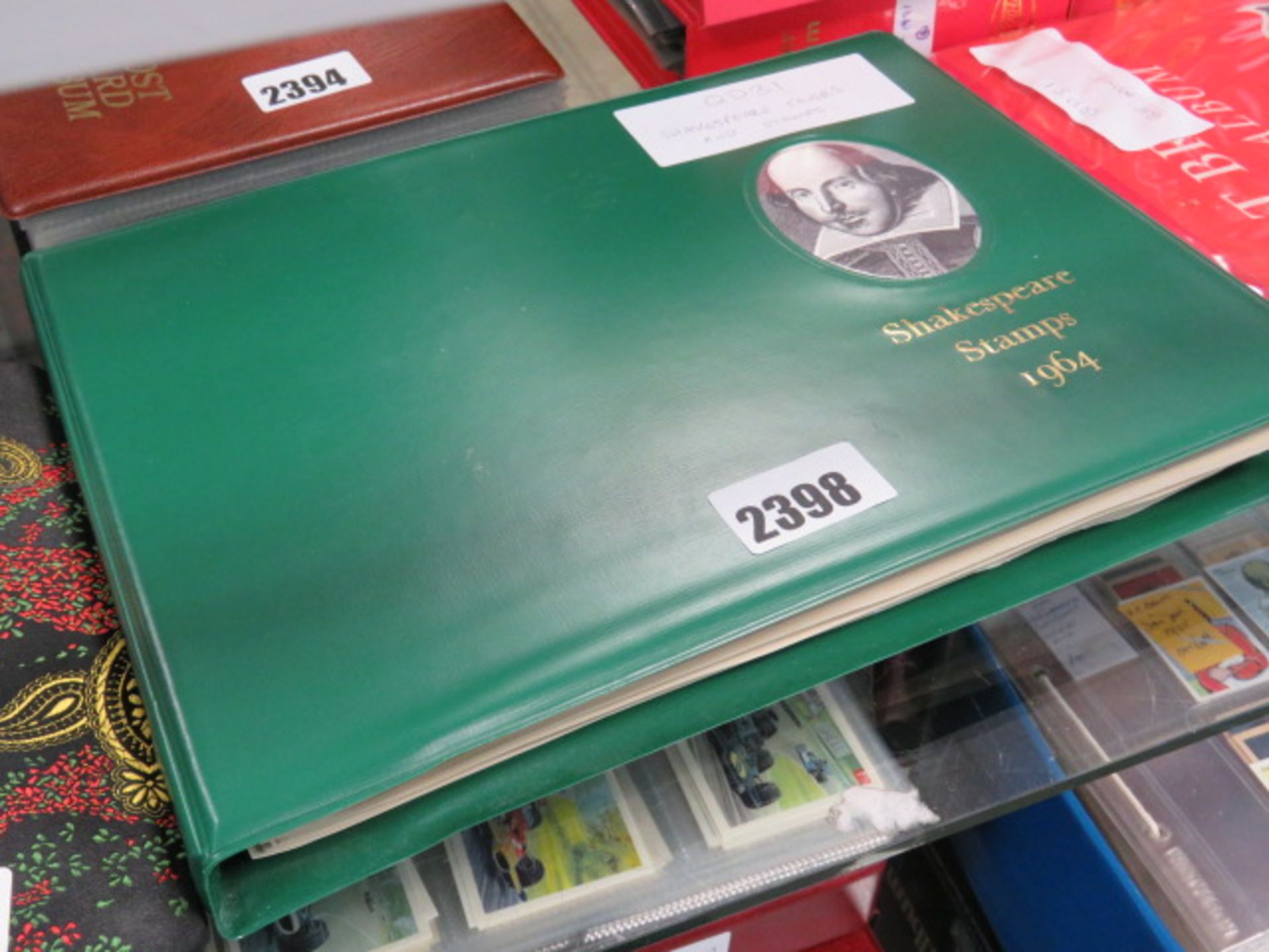 Shakespeare covers and stamps in green binder