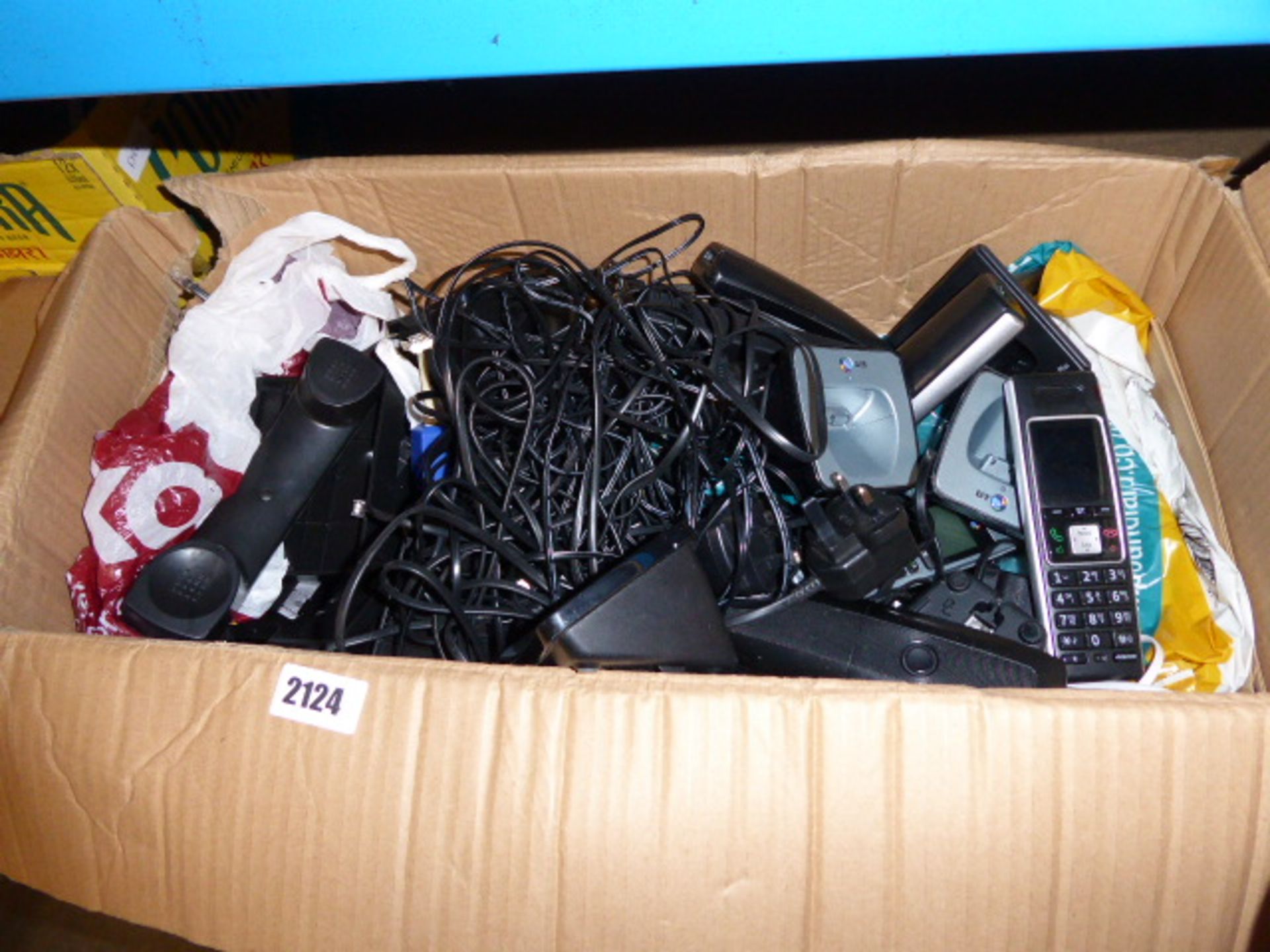 Box of various mobile phone telecoms units by BT and others
