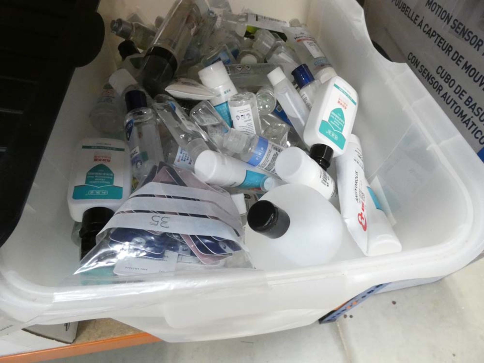 Large box containing mixed hand sanitizers, etc