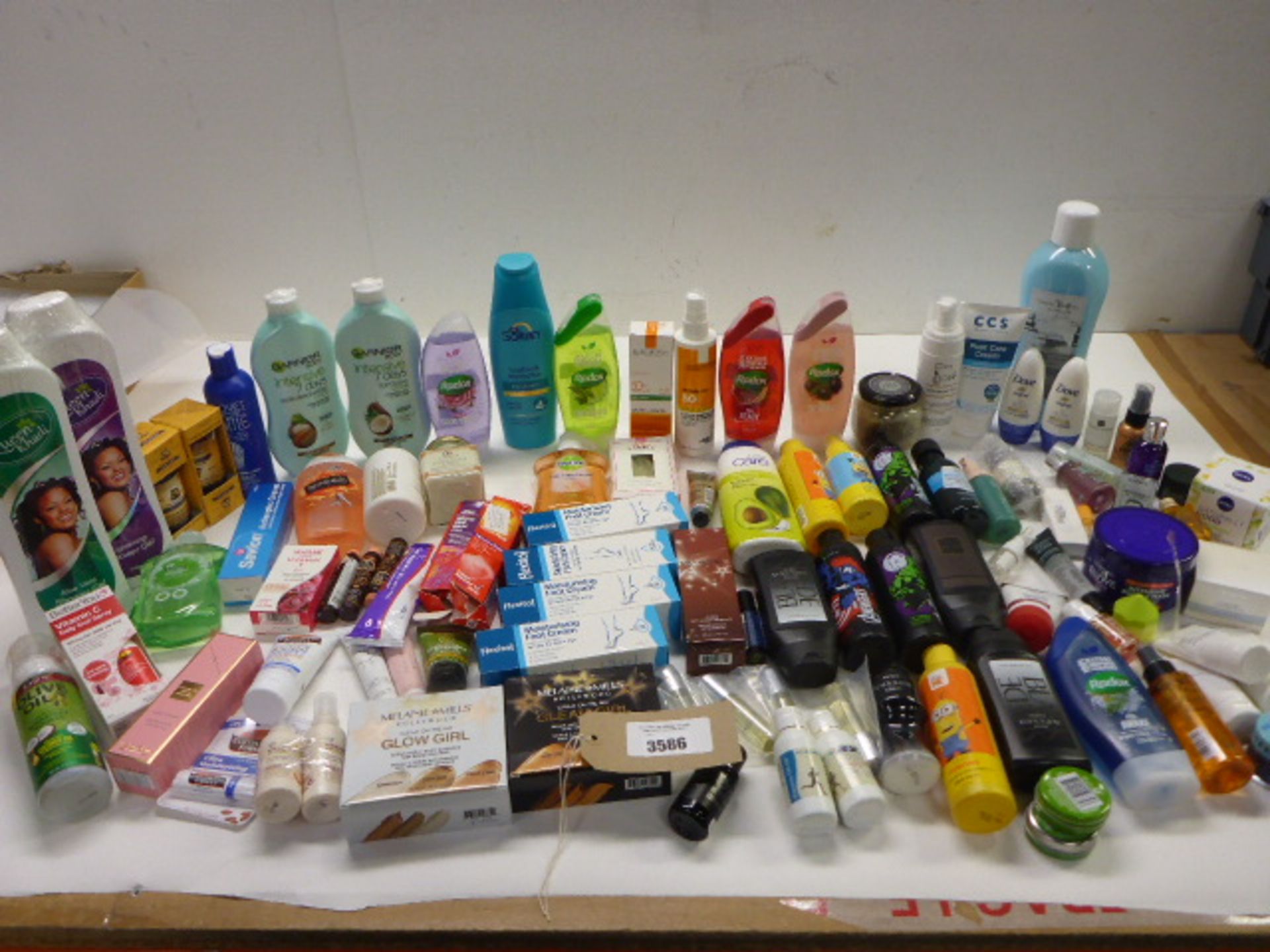 Large bag of toiletries including lotions, face & body wash, deodorant, deep heat cream, Oral spray,