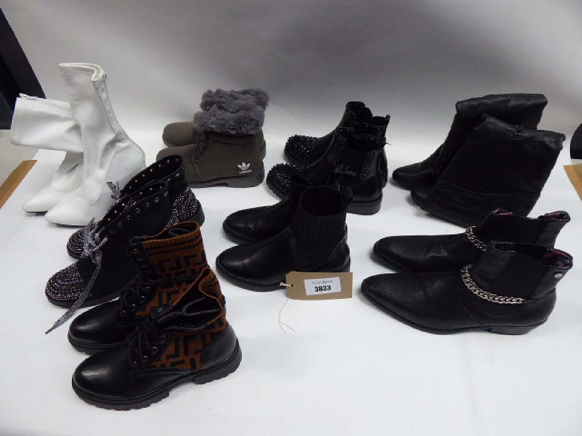 Bag of assorted boots and ankle boots