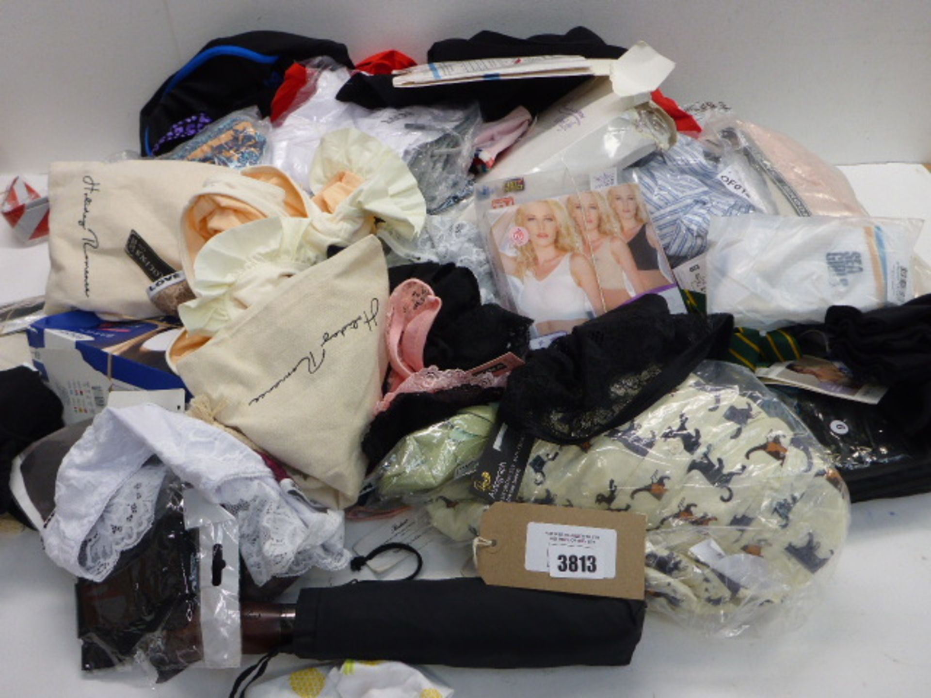 Large bag of assorted accessories including hats, socks, scarves, swim & underwear, belts etc