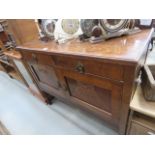 5103 - A dark wood two drawers over two doors sideboard