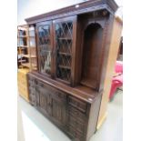 Dark wood glazed sideboard with linen fold doors