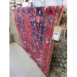 8 - Iranian carpet in red and blue