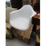 White plastic rocking tub chair