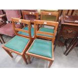 4 oak framed ladder back dining chairs with green rexine seating