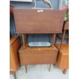 A pair of teak drop-front LP storage units