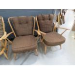 A pair of Ercol lounge armchairs with brown fabric *Sold subject to our soft furnishings policy