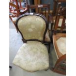 2 chairs with dark wood frame, one shield back form, one spindle back form with floral upholstery *