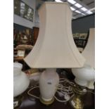 Table lamp with white and full decorated vase base and cream top