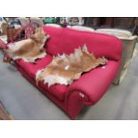 Red two seater sofa