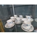 A quantity of Colclough china, to include: tea cups, saucers, cream jugs and sugar bowls