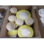 A single box of yellow and white Johnson Brothers china