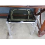 Chrome based occasional table with clear class insert