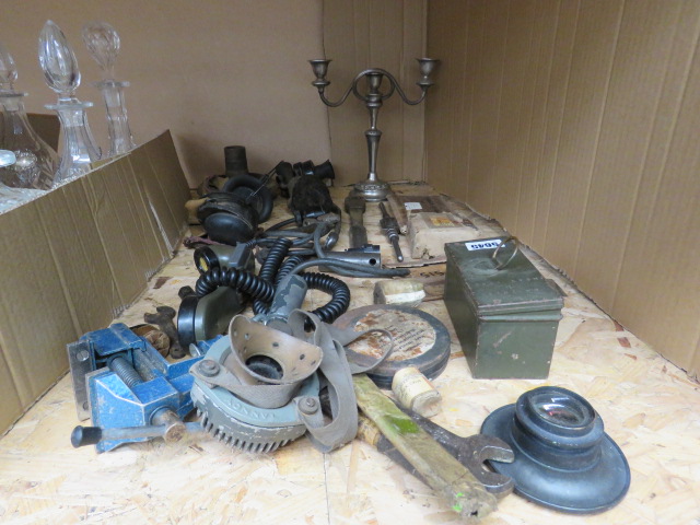 Part cage of assorted items to include candlesticks, military phone sets, headsets, anti gas