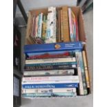 Two boxes of assorted books, to include military and heraldry books