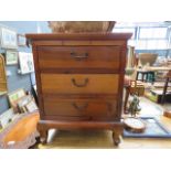 5036 - A three drawer pine bedside cabinet