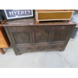 5003 - An oak blanket box with three panel and two drawers under