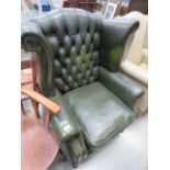 Green leather button backed winged armchair *Sold subject to our soft furnishings policy https://