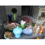 A cage of assorted items, to include: wine glasses, glass vases, blue glass trinket bowls etc