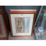 A pair of framed and glazed pictures of a countryside scene and a mountain scene