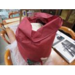 Red bag of cushion inserts