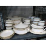 A cage of Paragon china, to include: gravy boats, tureens, cups, saucers and soup bowls