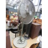 Tower fan and a pedestal fan