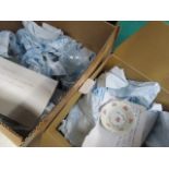 Three boxes of assorted household china to include floral decorated plates, glass bowls and
