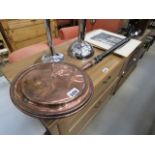 A copper bed pan