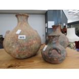 Three graduation Grecian-style urns