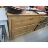 A pine modern two drawer chest of drawers