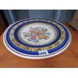 5004 - A large Portuguese plate, decorated in blue and flowers