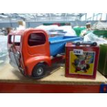 A Tri-ang metal children's dumb truck lorry, a wind-up clown jack-in-the-box