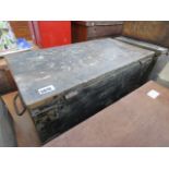 A metal banded black plainted trunk