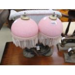 Pair of table lamps with organic formed bases and pink resin shades