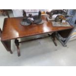 Ocassional table in dark wood with lions foot