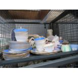 A cage of collectable china, to include: tea cups, mugs etc