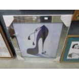 Mirrored framed print of a giant shoe