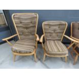 A pair of Ercol lounge armchairs with brown stripe fabric *Sold subject to our soft furnishings