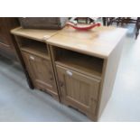 A pair of pine bedside cabinets