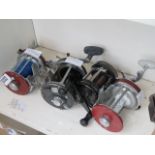 Four assorted sea fishing reels