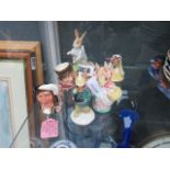 Seven Royal Doulton figurines, to include: Bunnykins, miniature Toby jugs etc