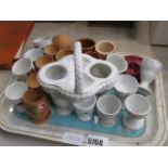 A metal tray of egg cups