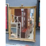 A gilt framed rectangular mirror