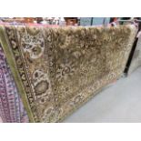 6 - large carpet in green with floral design