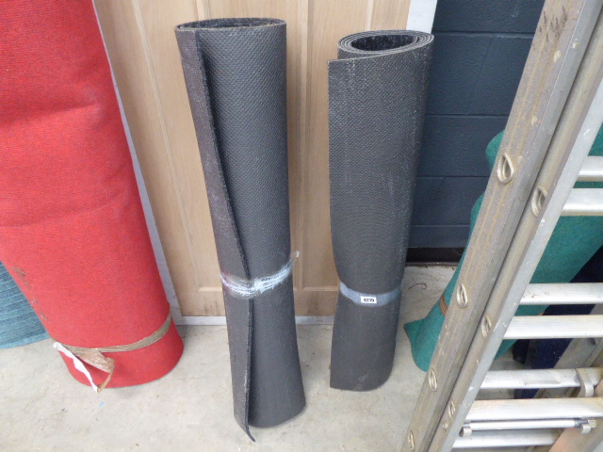 2 rolls of rubber backed commercial carpet in black